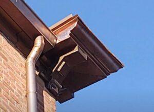 Copper gutters and downspouts